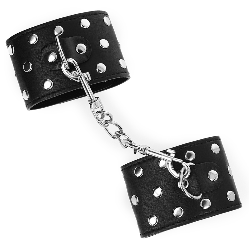 KINK - WRIST RESTRAINTS WITH PUSH CLOSURE, FULL OF RIVETS, BLACK, ADJUSTABLE 19-24 CM X 5.5 CM